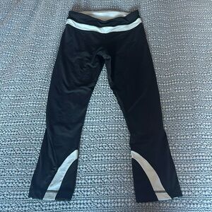 Lululemon cropped running pant; size 4; dark grey with light blue detail